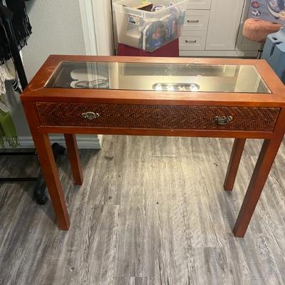 Small table with display drawer, Versace eyeglass frames