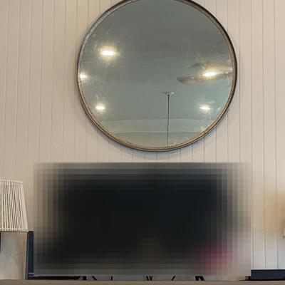 Two Lamps And Round Mirror