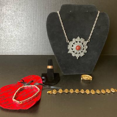 Vintage Jewelry Collection with Statement Necklace, Bracelets, and Brooch