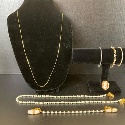 Elegant Jewelry Lot with Chains, Pearls, and Cameo