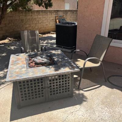 PROPANE FIRE PIT W/ 4 CHAIRS...