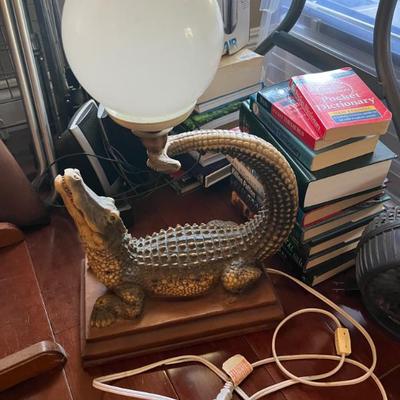 This Crocodile lamp is vintage and very cool! Reminds me of a lamp that would be on the show & in the bar of: "TRUE BLOOD."
