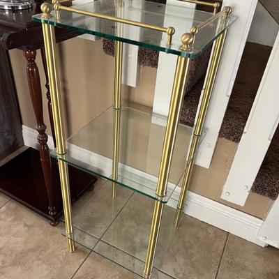 nice 3 tier brass & glass shelf unit.
