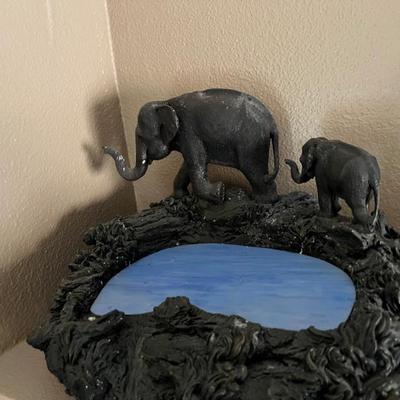 THIS IS A VINTAGE AFRICAN ELEPHANT LAMP W/ MOMMA & BABY ELEPHANT, LIGHT IS AT THE CENTER.