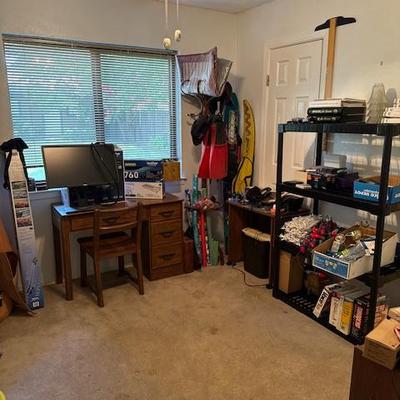 Desk, monitors, water ski