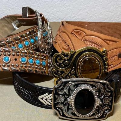 Trio of wester style style belts with buckles