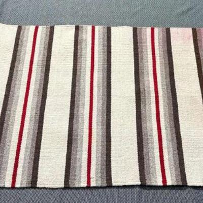 Navajo double saddle blanket mounted for wall display