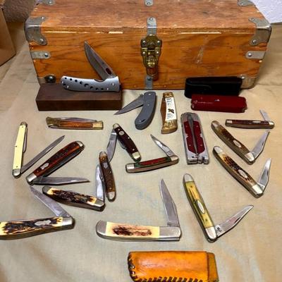 Vintage pocket knife assortment in a cool wood box