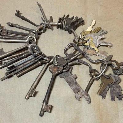 Antique keys an elfenbrau beer opener