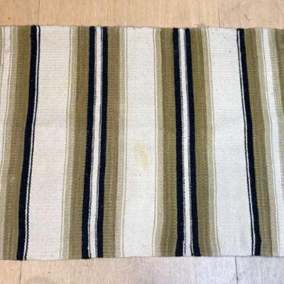 Navajo rug with block belleek plates