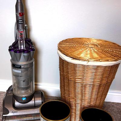 Dyson Pet Vacuum, Laundry Basket, And Two Trash Cans 