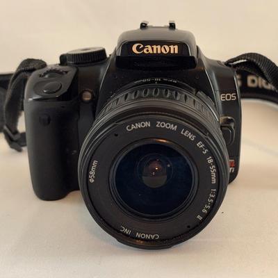 Canon EOS 400D DSLR camera with an EF-S 18-55mm lens