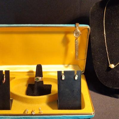 Gold And Goldtone Jewelry With An Aqua Velvet Jewelry Box