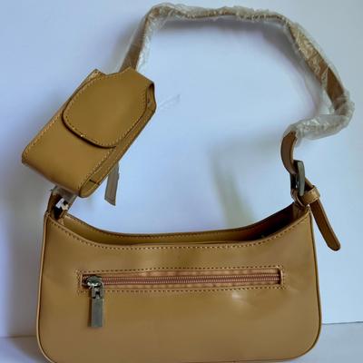 Brown hand bag with mobile case
