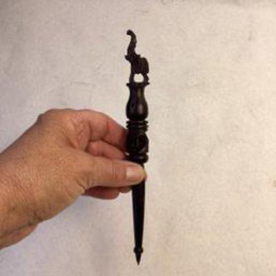 Carved wood pen 