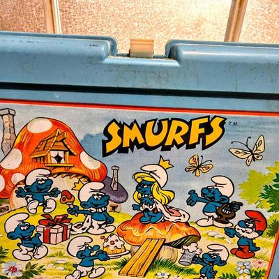 Sale Photo Thumbnail #64: Vintage Smurfs 1985 Plastic Lunch Box-Blue, With Yellow Thermos JEN8073 $34.99   - Warehouse: AAA Vintage 712 L And A Rd Suite B Metairie, LA 70001 Hours By Appointment Thursday - Saturday 10-4