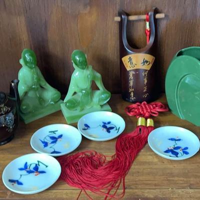 Asian-Inspired Decorative Grouping Featuring Green Red Wing Pottery Vase, Carved Figures, and More