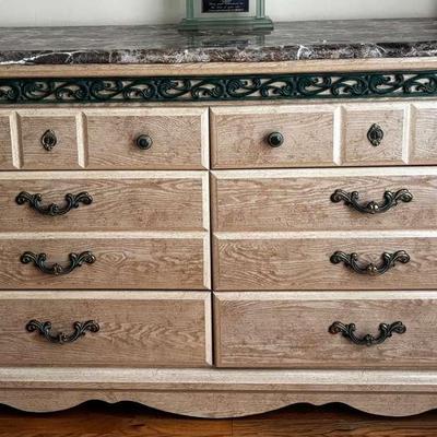 Marble-Top Dresser with Green Accents and Ornate Carvings