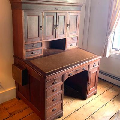 Antique walnut Station Master’s desk in original condition, hardware and keys. 54” wide 