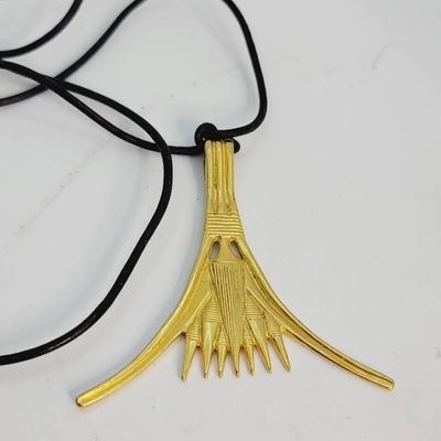 MOMA Egyptian Revival Cast Pendant on Cord 1976