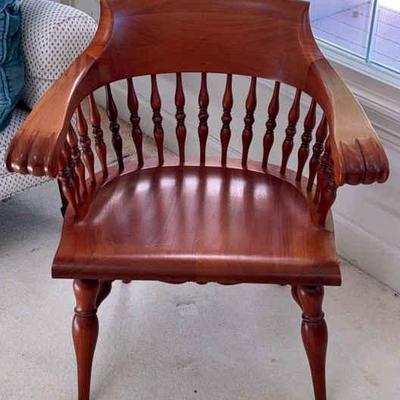 Windsor style accent chair with claw arms