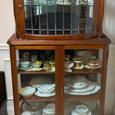 A pair of antique display cabinets