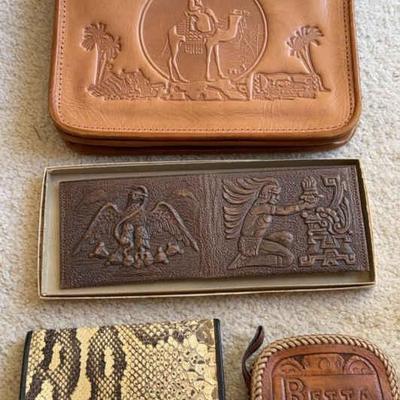 Two old leather purses and wallet