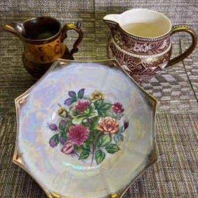 Pitchers and floral bowl