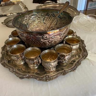 Sale Photo Thumbnail #43: Sheffield Silver Plated, 14 piece, hand chased punch bowl, 12 cups, and Ladle.
Made in England, by Frank Cobb in Sheffield 1970’s