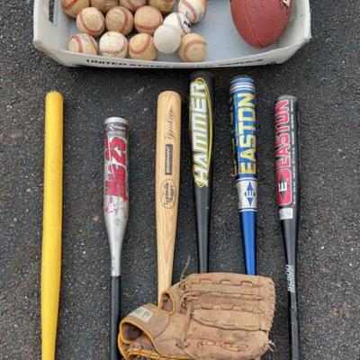 Assorted lot of baseball, football, and whiffle ball items