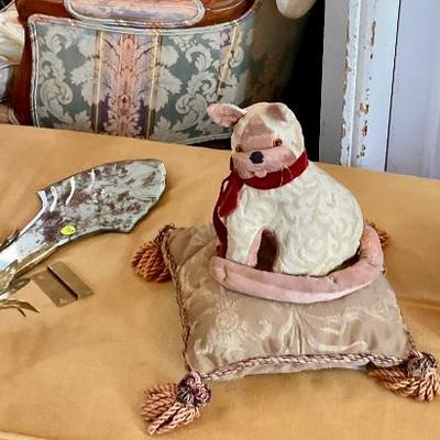 Stuffed dog on pillow