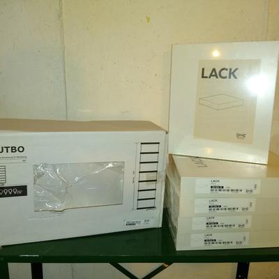Lot with new in package Ikea floating shelves and floor lamp