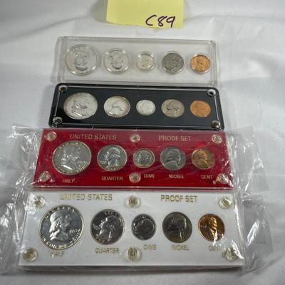 Lot Of Uncirculated Coins In Plastic Cases