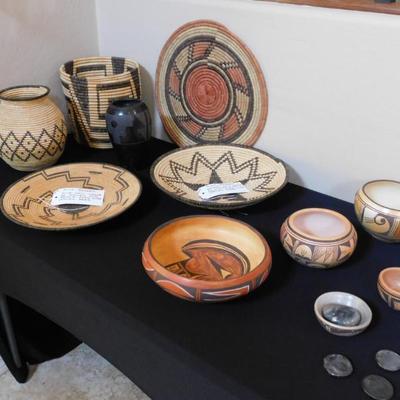 Native American baskets and pottery. The two flats are both Pima, medium coil weave of willow and devils claw over cattail reed.
