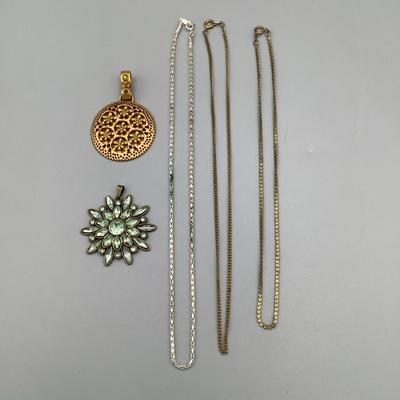 Two Pendants And Three Necklaces 