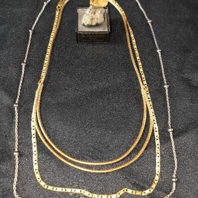 24k GP Pyrite Figure, 2 Gold Toned Sterling 750 Necklaces, And Sterling Silver Stamped 925 Necklace