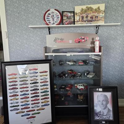 Lot of 39 Model cars, framed poster, Ford Mustang clock, Mustang 6-speed gear shift & more