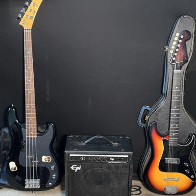 Amp And Two Electric Guitars