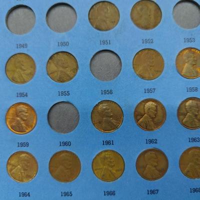 4 collector albums with old Indian head pennies and steel pennies and wheat pennies and Lincoln cents....... Late 1800s thru 1970s