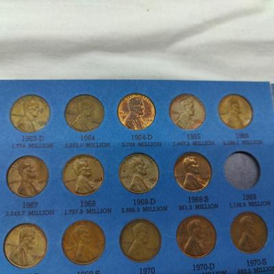 4 collector albums with old Indian head pennies and steel pennies and wheat pennies and Lincoln cents....... Late 1800s thru 1970s