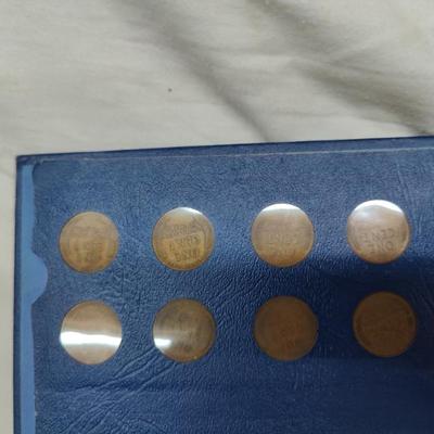 4 collector albums with old Indian head pennies and steel pennies and wheat pennies and Lincoln cents....... Late 1800s thru 1970s