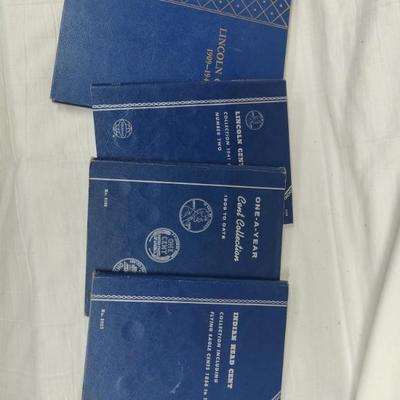4 collector albums with old Indian head pennies and steel pennies and wheat pennies and Lincoln cents....... Late 1800s thru 1970s