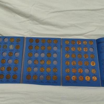 4 collector albums with old Indian head pennies and steel pennies and wheat pennies and Lincoln cents....... Late 1800s thru 1970s