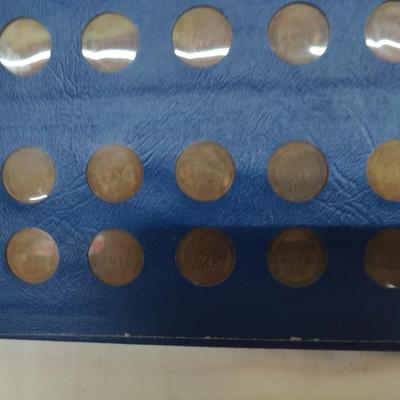 4 collector albums with old Indian head pennies and steel pennies and wheat pennies and Lincoln cents....... Late 1800s thru 1970s