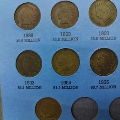4 collector albums with old Indian head pennies and steel pennies and wheat pennies and Lincoln cents....... Late 1800s thru 1970s