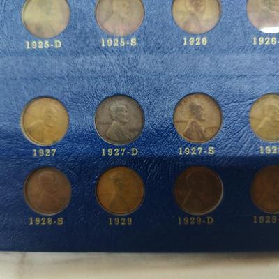 4 collector albums with old Indian head pennies and steel pennies and wheat pennies and Lincoln cents....... Late 1800s thru 1970s