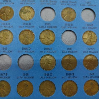 4 collector albums with old Indian head pennies and steel pennies and wheat pennies and Lincoln cents....... Late 1800s thru 1970s