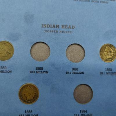 4 collector albums with old Indian head pennies and steel pennies and wheat pennies and Lincoln cents....... Late 1800s thru 1970s