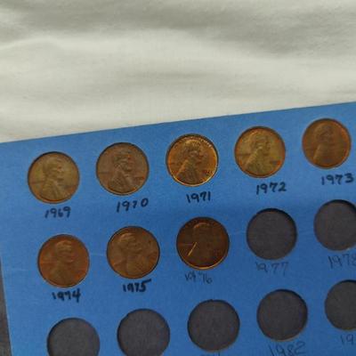 4 collector albums with old Indian head pennies and steel pennies and wheat pennies and Lincoln cents....... Late 1800s thru 1970s