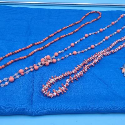 Three Coral Toned Necklaces and More